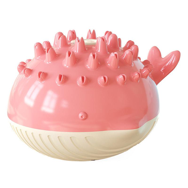 Pink dog toy with spiky texture on a white background - The PetRiot